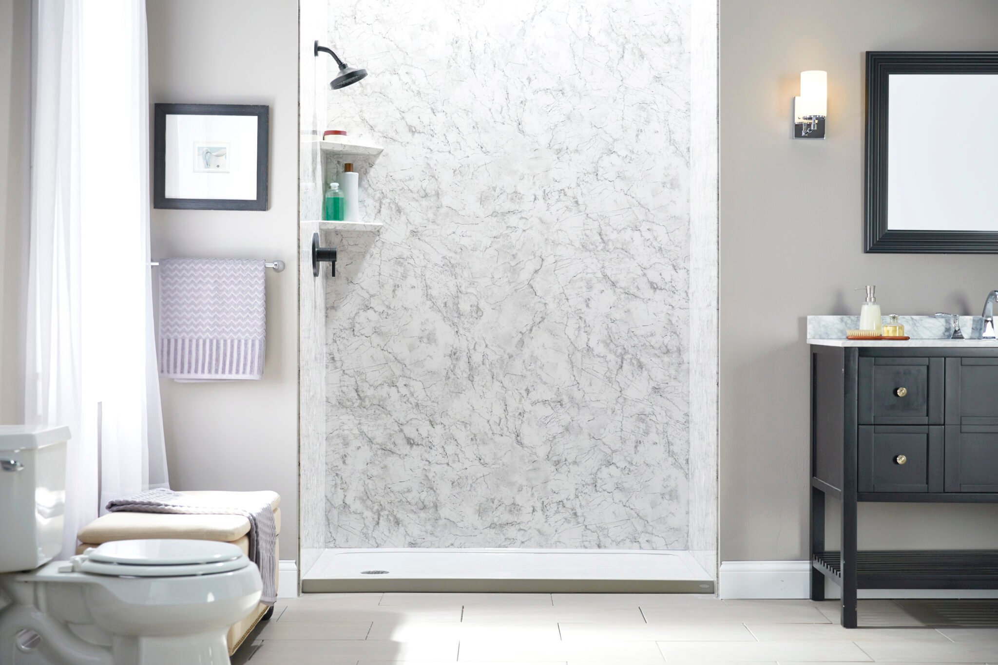 Photo of a walk in shower with a low threshold and corner shelves