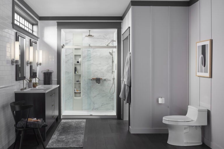 Photo of a KOHLER Calacatta Crema acrylic walk in shower