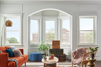 Living room with beautiful bay windows by MIWindows